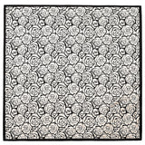 foulard carré en soie noir et blanc motif rose graphique